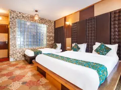 Luxurious double bed hotel room interior.