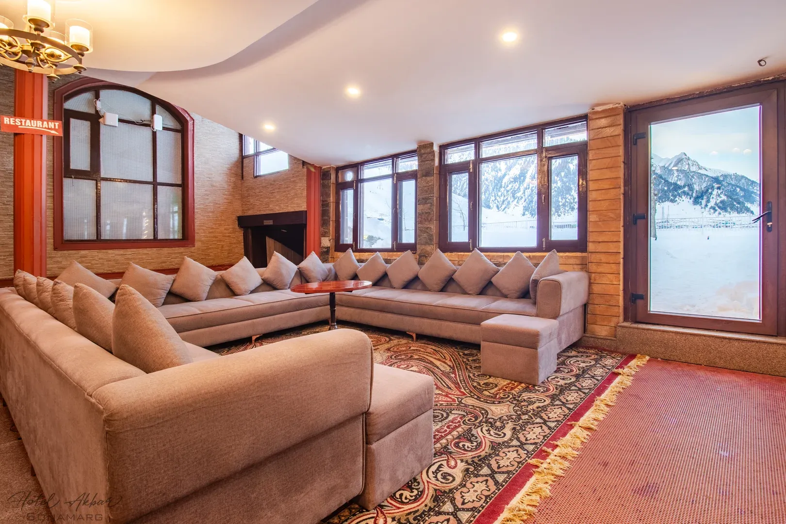 Luxurious seating arrangement, mountain vista backdrop.