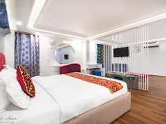 Luxurious Sonmarg hotel bedroom interior view.