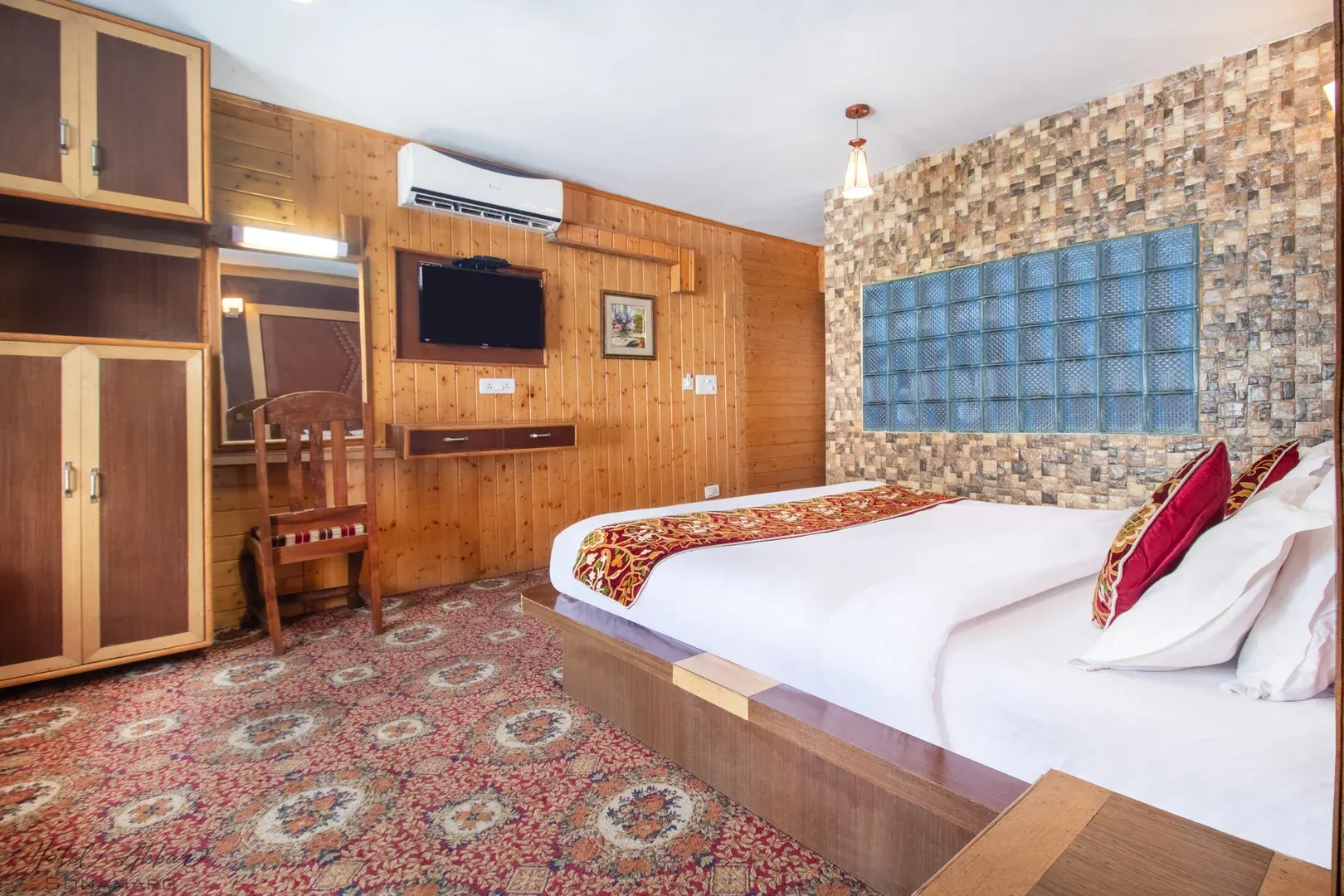 Luxurious Sonmarg hotel room interior design view.