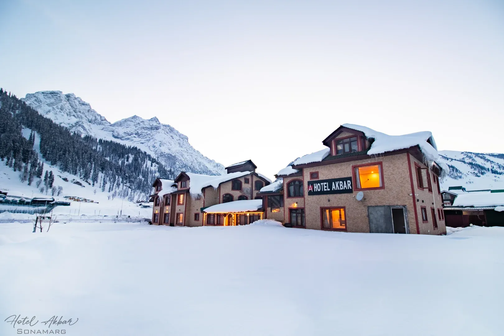 Hotel Akbar Sonmarg luxury mountain hotel surrounded by snow-capped Himalayan peaks